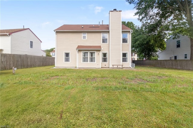 1760 Moonstone Dr, Virginia Beach, VA 23456 - back of house featuring a chimney and a fenced backyard