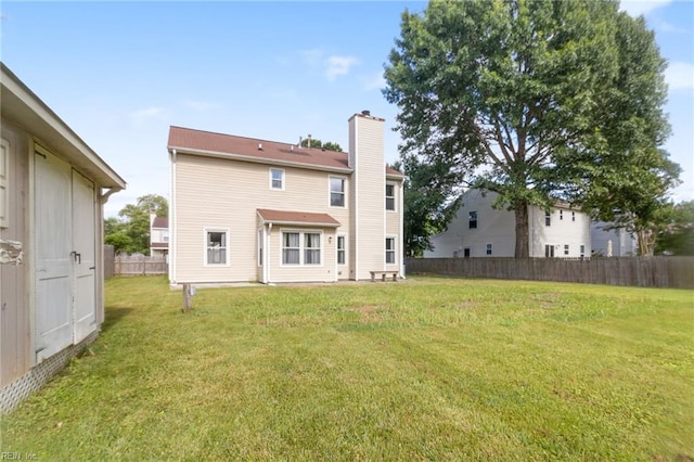 1760 Moonstone Dr, Virginia Beach, VA 23456 - back of house featuring a chimney