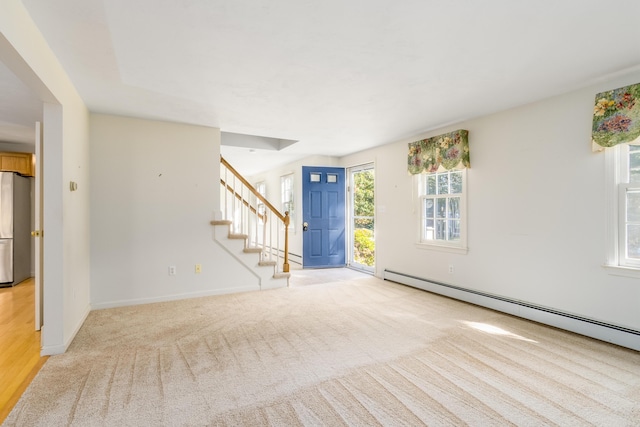 53 Snead Dr, Mashpee, MA 02649 - carpeted empty room featuring baseboard heating