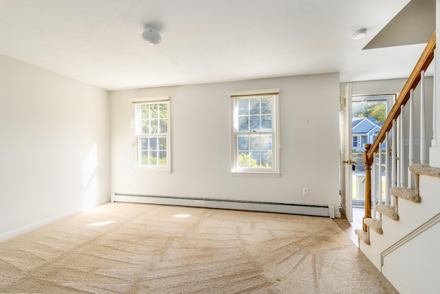 53 Snead Dr, Mashpee, MA 02649 - carpeted spare room featuring baseboard heating and plenty of natural light