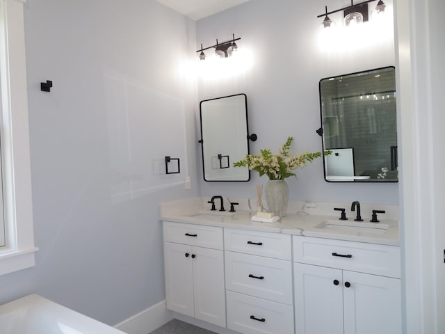 18 Pleasant Park Dr, Mashpee, MA 02649 - full bath featuring double vanity, a shower stall, and a freestanding tub