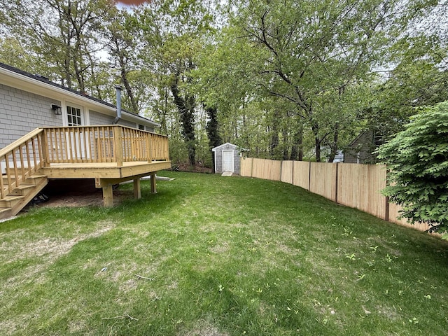 view of yard with a wooden deck