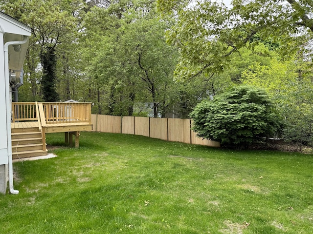 view of yard featuring a deck