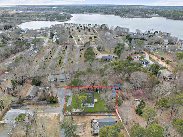 aerial overview of property's location with a large body of water and property boundaries highlighted