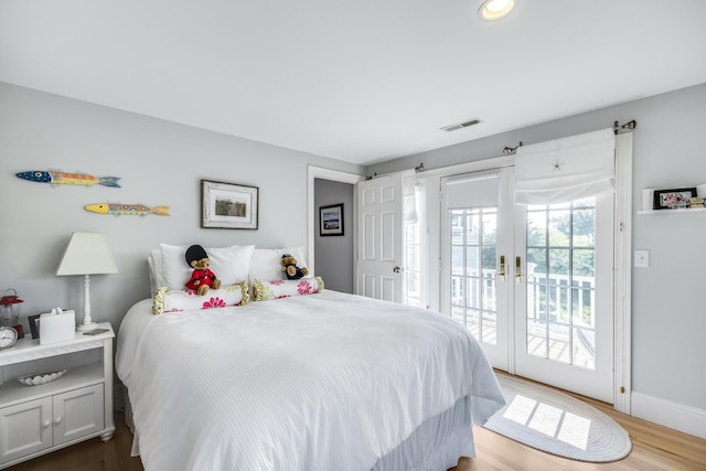 88 Champlain Rd, Chatham, MA 02633 - bedroom featuring access to exterior, wood finished floors, french doors, and recessed lighting