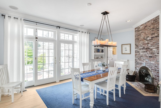 88 Champlain Rd, Chatham, MA 02633 - dining area featuring wood finished floors and crown molding