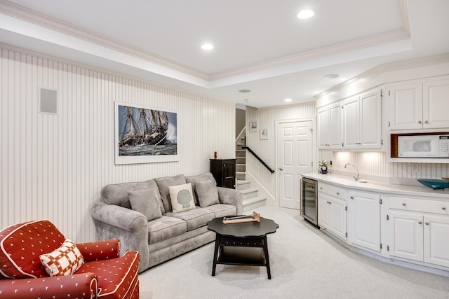 88 Champlain Rd, Chatham, MA 02633 - living area with wine cooler, ornamental molding, stairway, light carpet, and recessed lighting