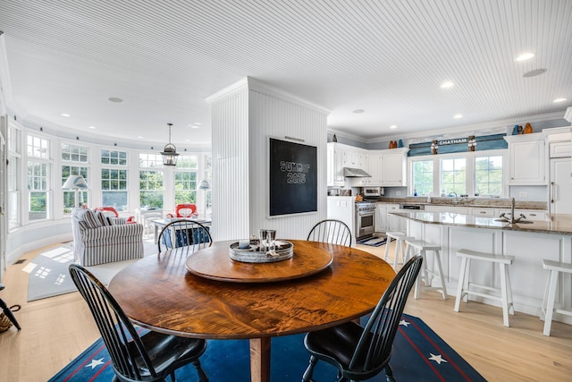 88 Champlain Rd, Chatham, MA 02633 - dining space with crown molding, light wood-style flooring, and recessed lighting