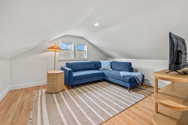 72 Forest Beach Rd, South Chatham, MA 02659 - living room with vaulted ceiling, wood finished floors, and baseboards