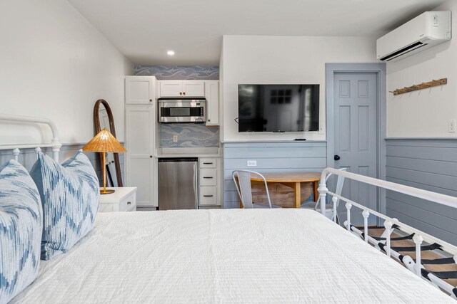 72 Forest Beach Rd, South Chatham, MA 02659 - bedroom featuring fridge, a wall mounted AC, and recessed lighting