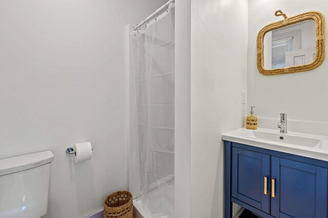 72 Forest Beach Rd, South Chatham, MA 02659 - full bathroom featuring toilet, vanity, and curtained shower