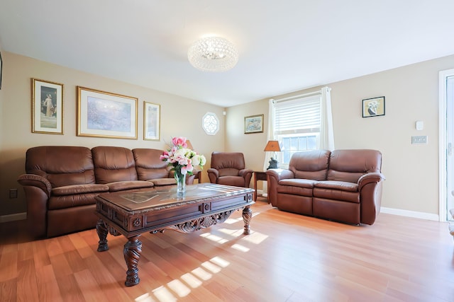 living room with light hardwood / wood-style flooring