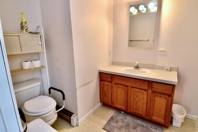 62 Jernegan Ave, Edgartown, MA 02539 - bathroom featuring toilet, vanity, and baseboards