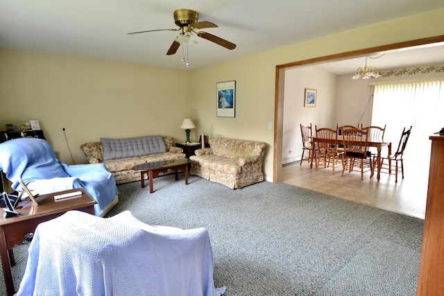 62 Jernegan Ave, Edgartown, MA 02539 - living room with a ceiling fan, carpet flooring, and a chandelier
