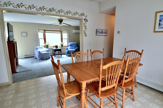 62 Jernegan Ave, Edgartown, MA 02539 - dining space featuring a baseboard radiator, a ceiling fan, and baseboards