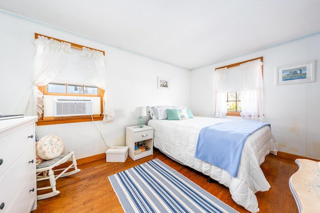 99 Heritage Ln, Chatham, MA 02633 - bedroom featuring light wood-style floors, baseboards, and cooling unit