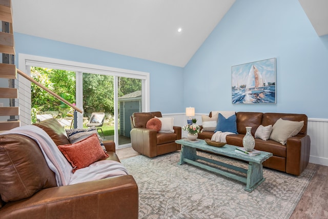 290 Fletcher Ln, Brewster, MA 02631 - living room featuring wood finished floors, wainscoting, and high vaulted ceiling