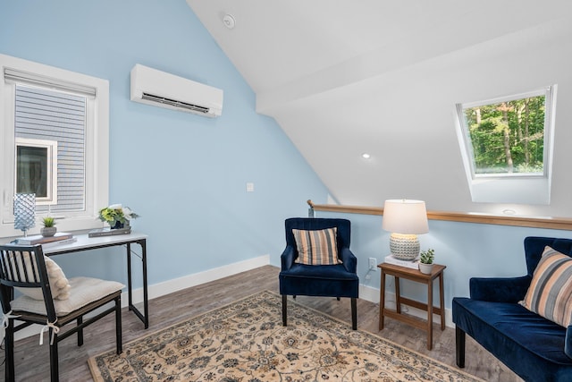 290 Fletcher Ln, Brewster, MA 02631 - sitting room featuring a wall unit AC, lofted ceiling, wood finished floors, and a skylight