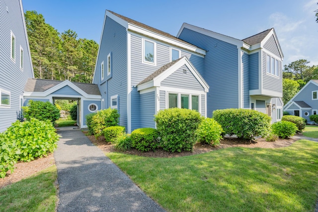290 Fletcher Ln, Brewster, MA 02631 - view of front facade featuring a front lawn