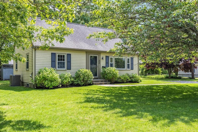 22 Emerson Rd, East Falmouth, MA 02536 - view of front facade featuring a shingled roof and a front yard