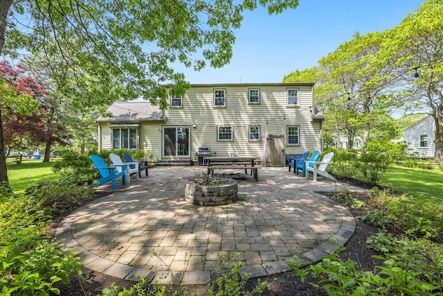 22 Emerson Rd, East Falmouth, MA 02536 - back of house featuring a patio area