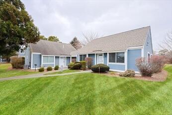 view of front of home with a front lawn