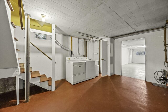 basement with independent washer and dryer and stairs