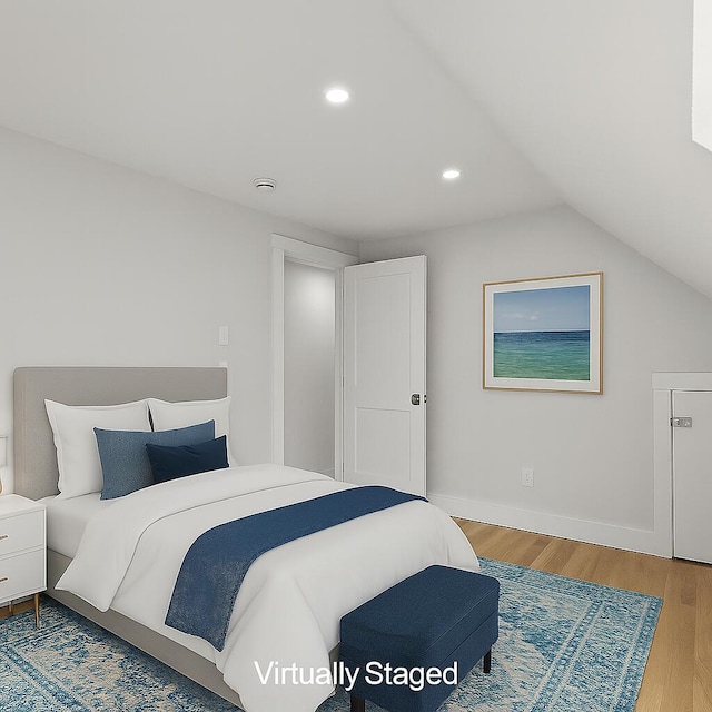 176 Palmer Ave Unit 2, Falmouth, MA 02540 - bedroom featuring wood finished floors, lofted ceiling, and recessed lighting