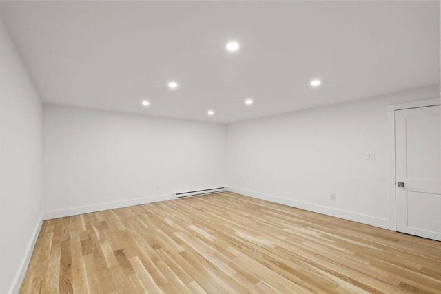 176 Palmer Ave Unit 2, Falmouth, MA 02540 - spare room featuring baseboard heating, light wood-style flooring, and recessed lighting