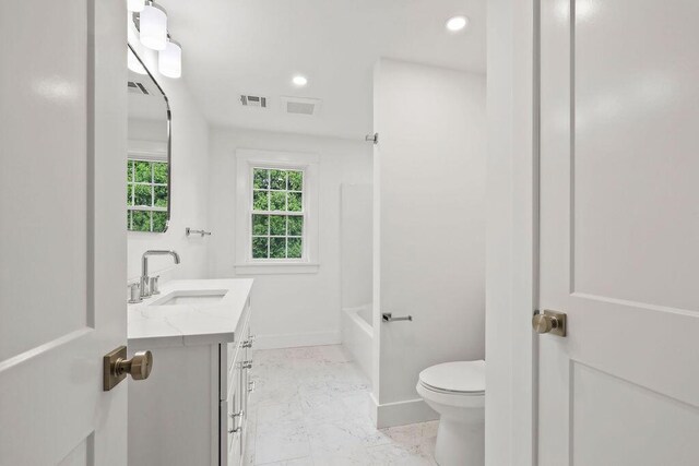 176 Palmer Ave Unit 2, Falmouth, MA 02540 - bathroom featuring vanity, marble look tiles, recessed lighting, and shower / bathtub combination