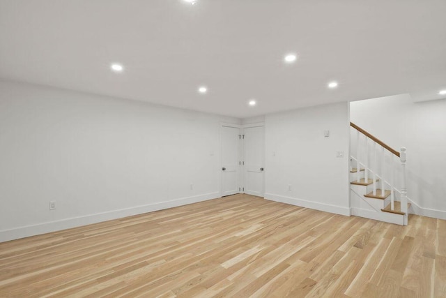 176 Palmer Ave Unit 2, Falmouth, MA 02540 - finished below grade area with stairway, recessed lighting, and light wood-style floors