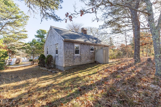 view of property exterior featuring a yard