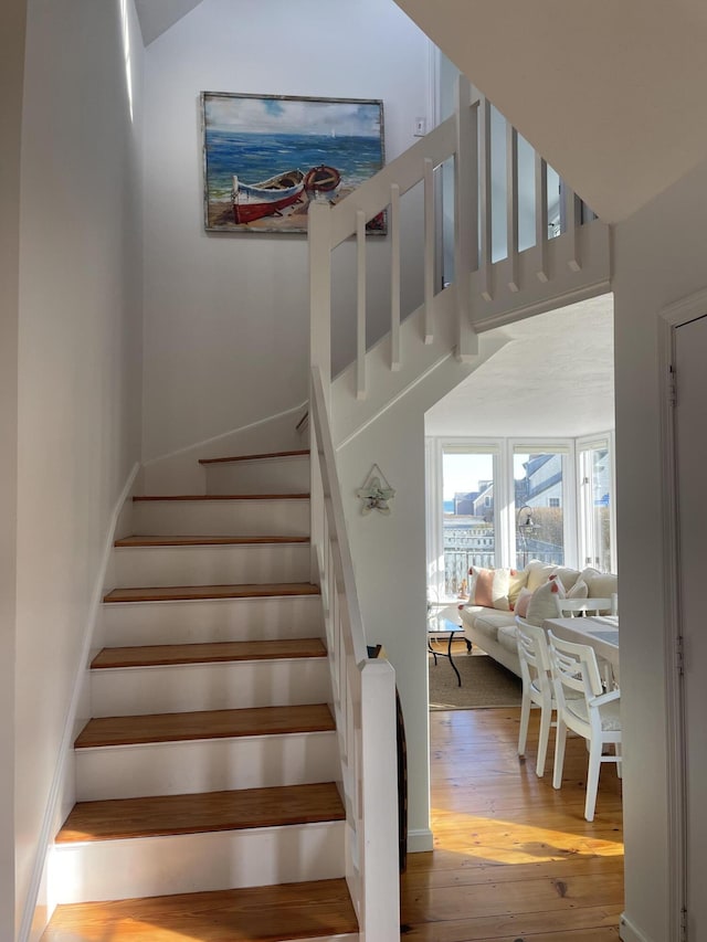 16 Hydrangea Ln, Mashpee, MA 02649 - stairs featuring wood finished floors and a towering ceiling