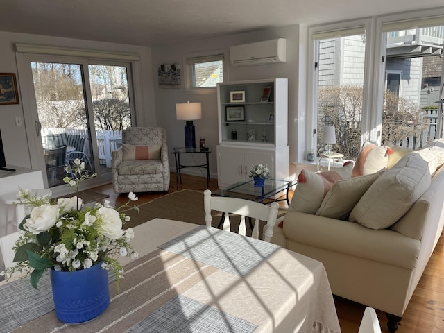 16 Hydrangea Ln, Mashpee, MA 02649 - living room with a wall mounted AC and wood finished floors