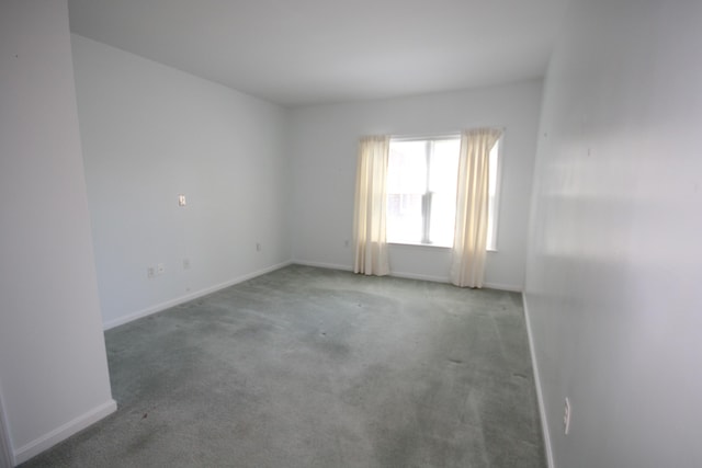 110 Dillingham Ave Unit 212U, Falmouth, MA 02540 - carpeted spare room with baseboards