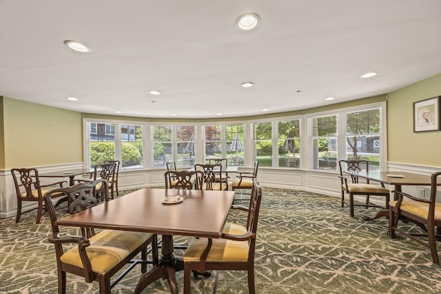 110 Dillingham Ave Unit 212U, Falmouth, MA 02540 - dining area with a decorative wall, plenty of natural light, a wainscoted wall, carpet flooring, and recessed lighting