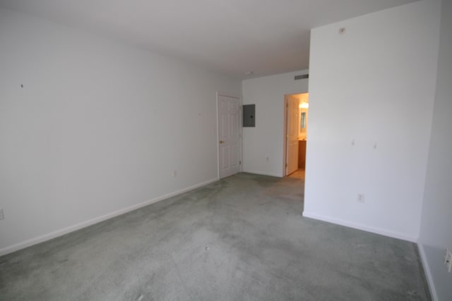 110 Dillingham Ave Unit 212U, Falmouth, MA 02540 - carpeted empty room with electric panel and baseboards