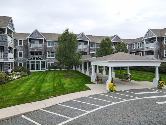 110 Dillingham Ave Unit 212U, Falmouth, MA 02540 - view of property's community with a gazebo, uncovered parking, and a lawn