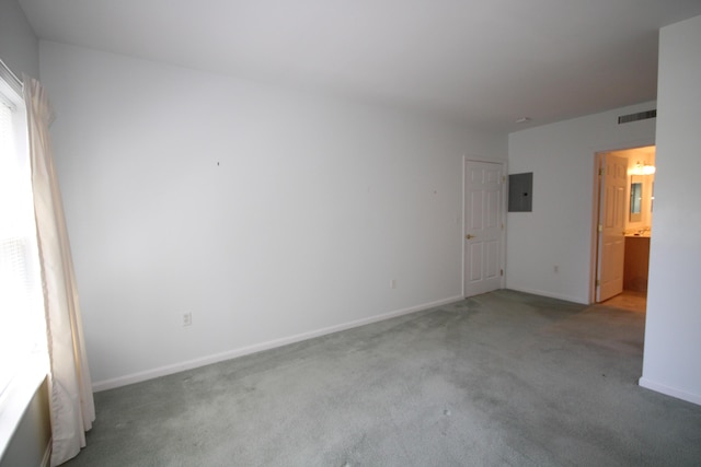 110 Dillingham Ave Unit 212U, Falmouth, MA 02540 - carpeted spare room with electric panel and baseboards