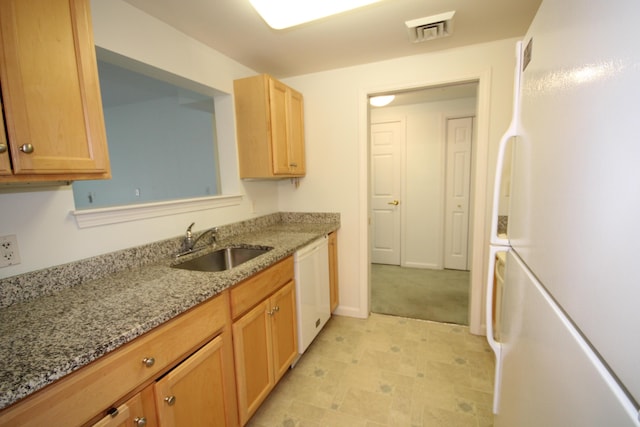110 Dillingham Ave Unit 212U, Falmouth, MA 02540 - kitchen featuring white appliances, light stone counters, and light floors
