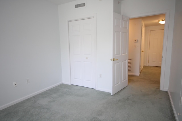 110 Dillingham Ave Unit 212U, Falmouth, MA 02540 - unfurnished bedroom featuring carpet floors and baseboards