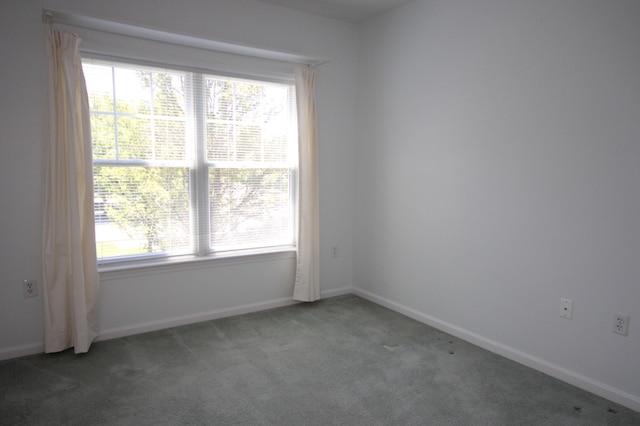 110 Dillingham Ave Unit 212U, Falmouth, MA 02540 - carpeted spare room featuring baseboards