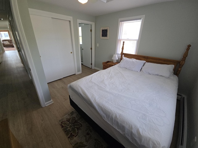 bedroom featuring wood finished floors