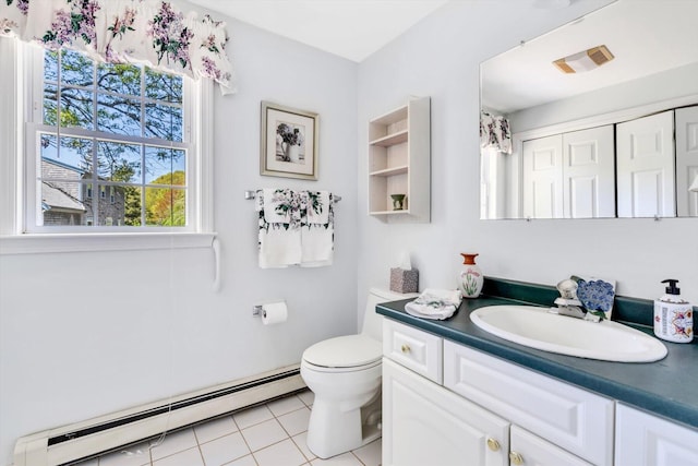 72 Rosemary Ln, Centerville, MA 02632 - bathroom with baseboard heating, toilet, vanity, and tile patterned flooring