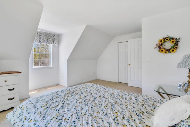 72 Rosemary Ln, Centerville, MA 02632 - carpeted bedroom with vaulted ceiling, a closet, and baseboards