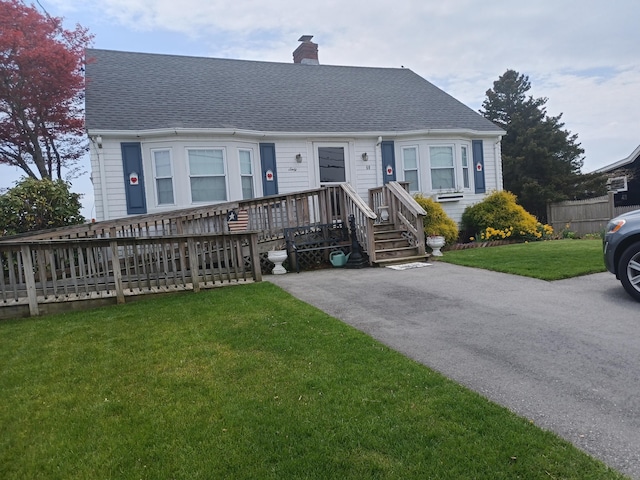 60 Academy Dr, Buzzards Bay, MA 02532 - cape cod home with a chimney and a shingled roof