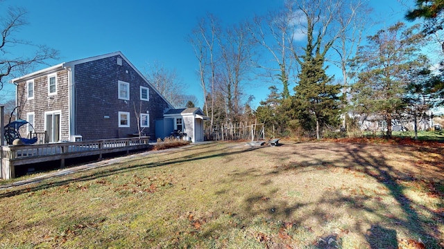 view of yard featuring a deck