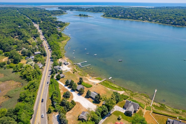 150 Old State Hwy Unit 6, Eastham, MA 02642 - aerial overview of property's location featuring a nearby body of water and a heavily wooded area