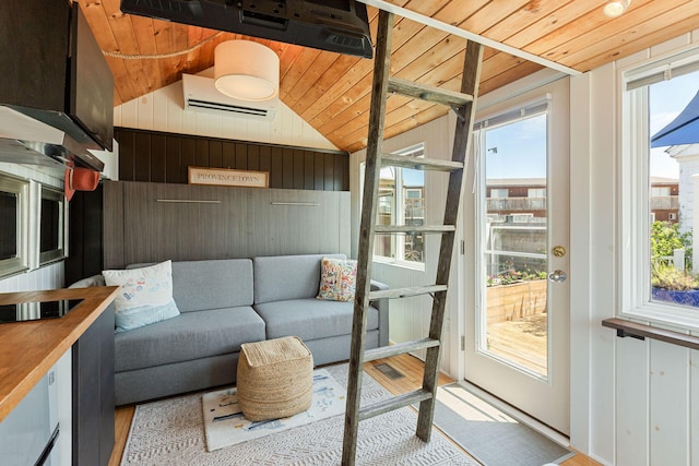 963 Commercial St Unit U30, Provincetown, MA 02657 - sunroom featuring a wall unit AC and vaulted ceiling