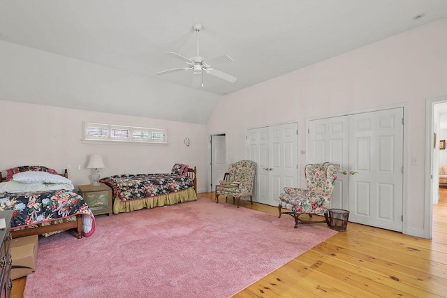 181 Pleasant St, South Yarmouth, MA 02664 - bedroom with hardwood / wood-style flooring, two closets, vaulted ceiling, and a ceiling fan